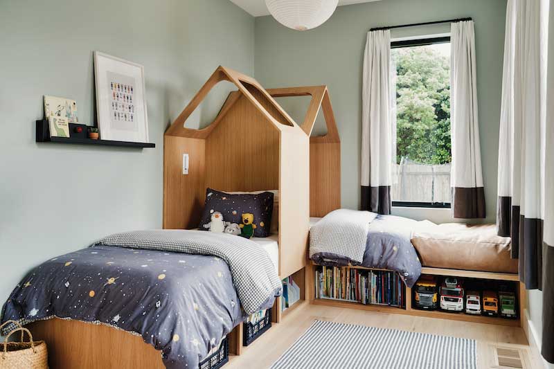Children’s bedroom in a railroad style home with Marvin Essential Casement window