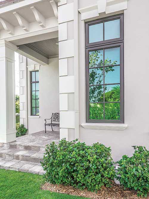 An exterior photo of a home with a Marvin Coastline casement window.