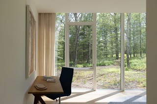 Living room with Marvin Signature Ultimate Direct Glaze and Casement windows