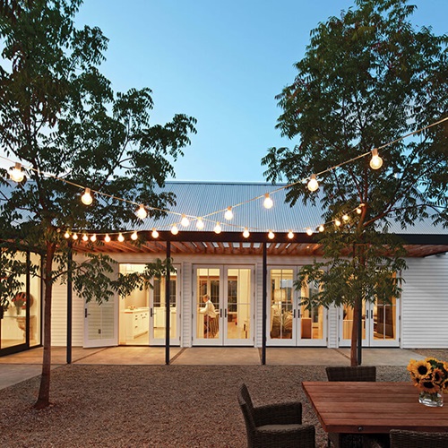 Backyard And Exterior View Of House With Signature Ultimate Swinging French Doors