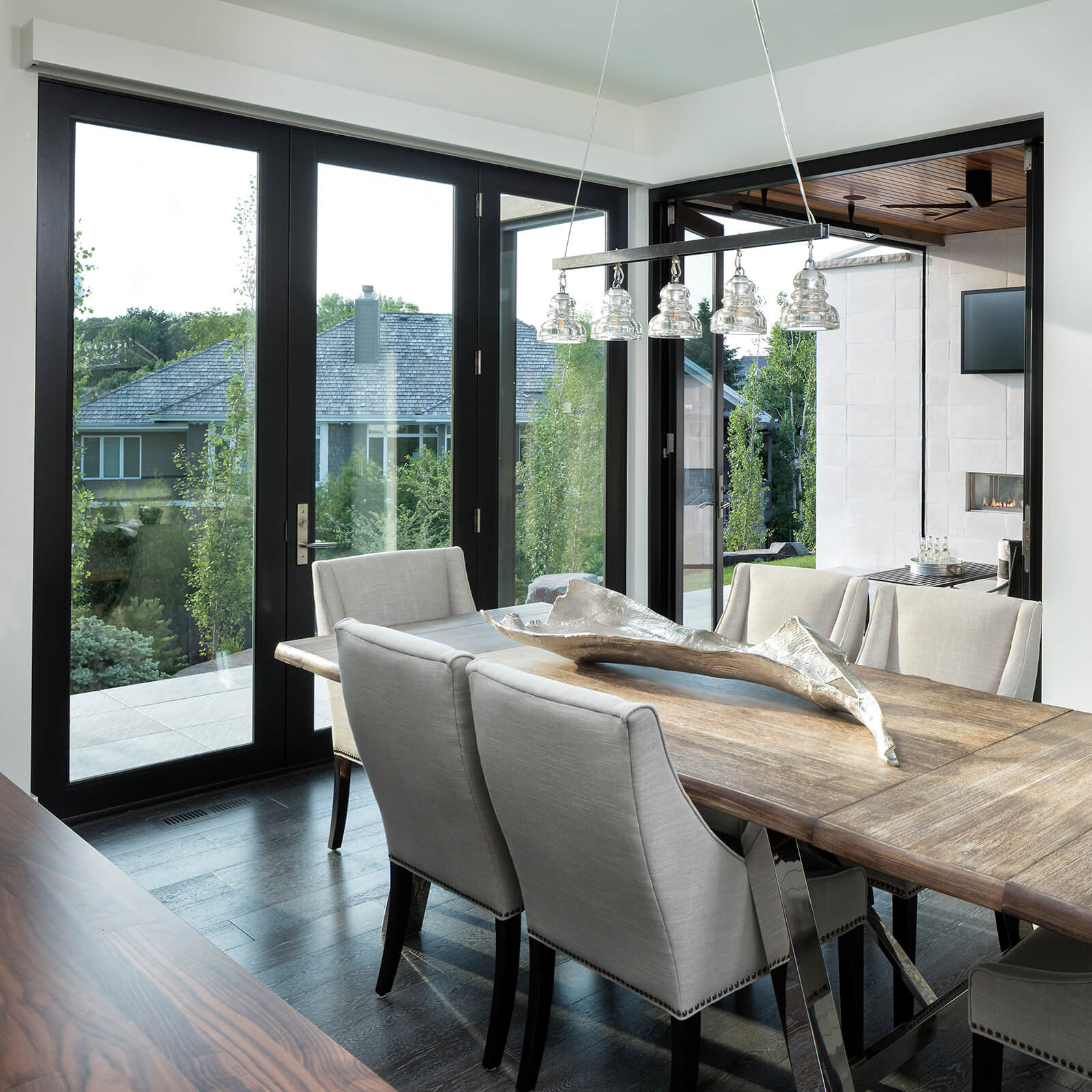 Modern style open concept dining room with Marvin Signature Ultimate Inswing French Door